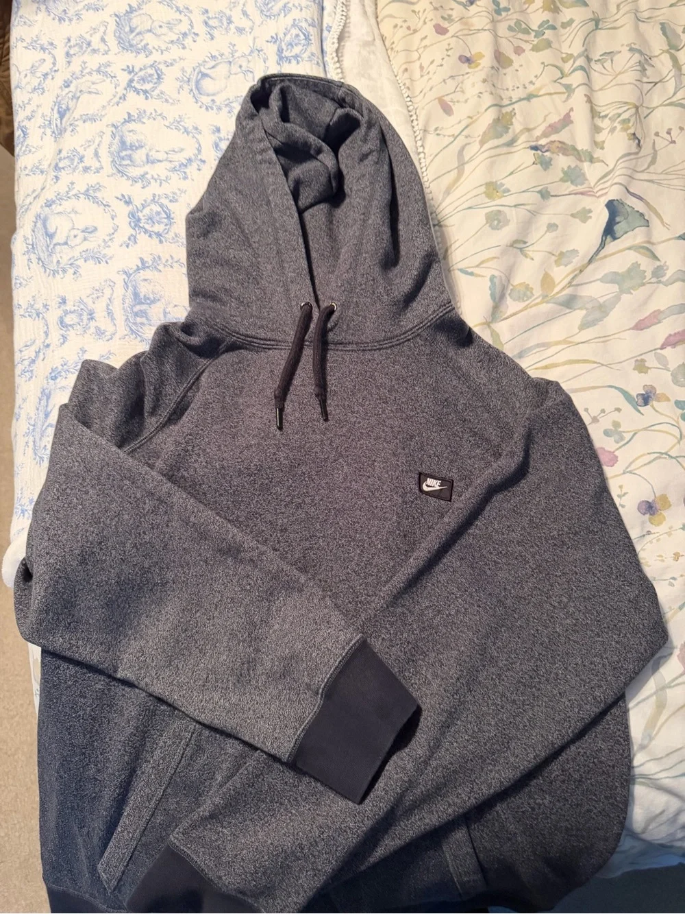 Nike Sportswear Heathered Knit Pullover Hoodie.